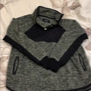 Cozy sweater can be used also as a jacket